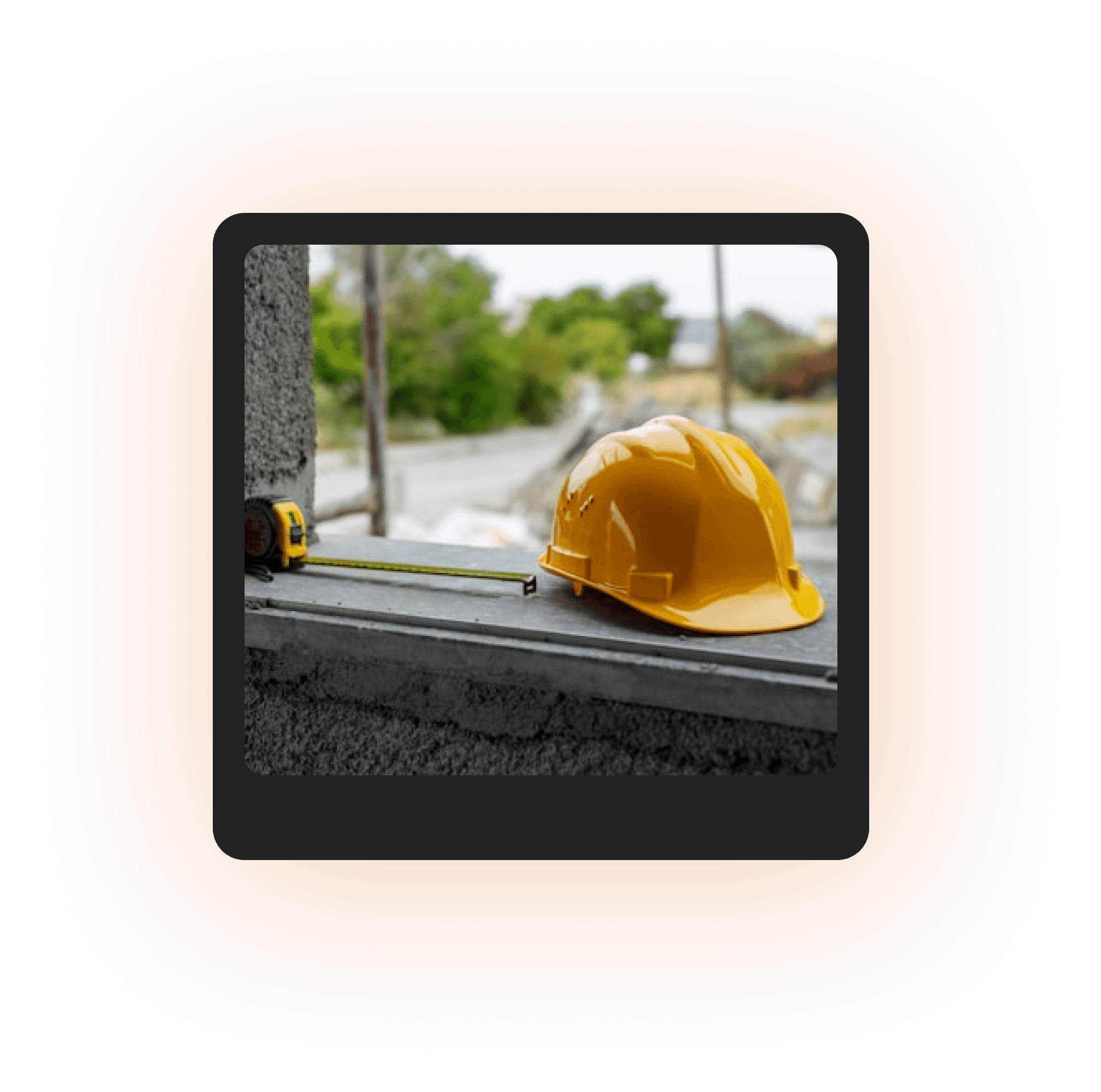 A yellow hard hat on a concrete windowsill at a construction site, with no timestamp, location, user, or structural context attached