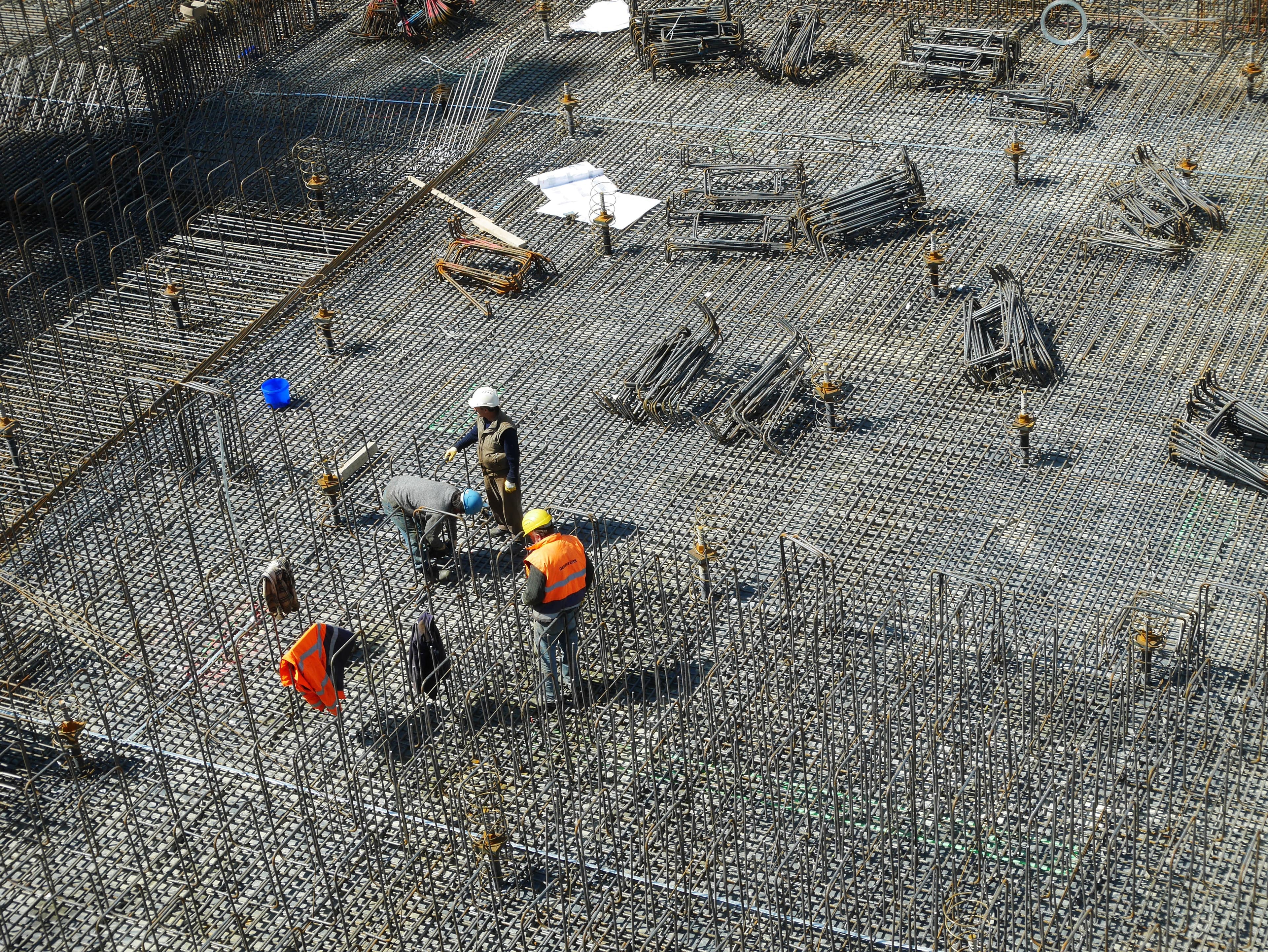 Foundation works showing rebar against poured concrete, captured with Thanex Photo Type: Foundations.